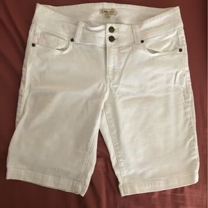 White denim walking shorts.